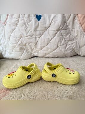 CROCS Kids Yellow Fuzzy Lined Clogs with Charms